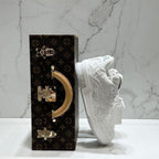 LV Trainer Sneaker – Triple White Monogram Embossed Edition