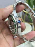 Submariner Date, 18K White Gold Diamonds Emerald